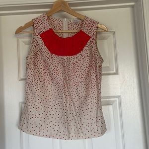 Cute orange and cream sleeveless top